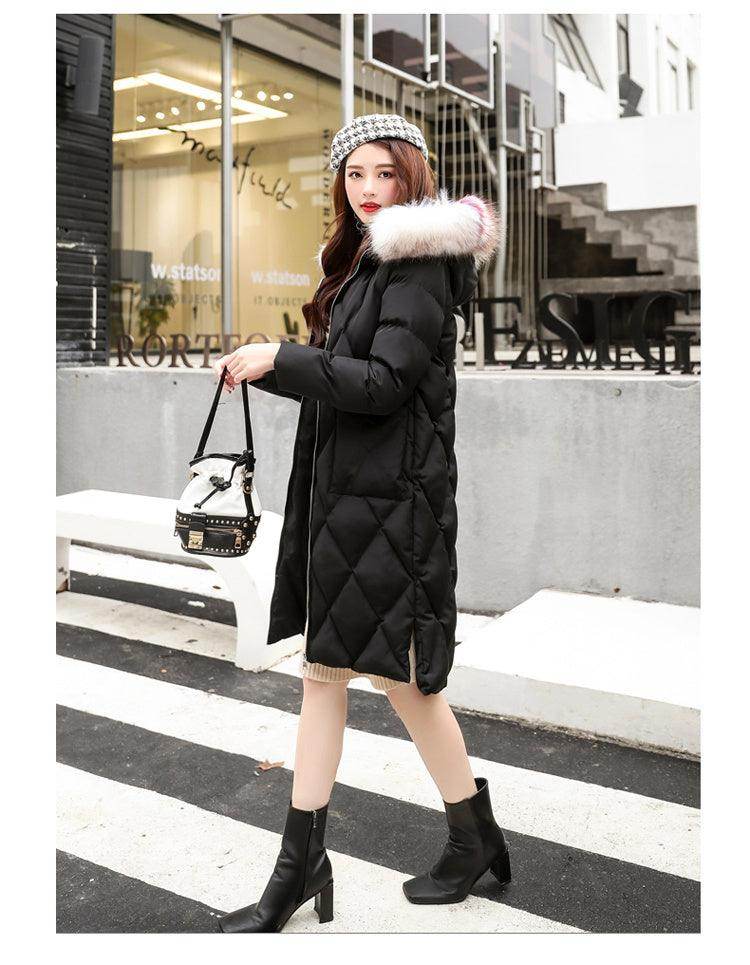 Autumn and Winter hooded fur collar long coat in black with tailored fit and deep pockets
