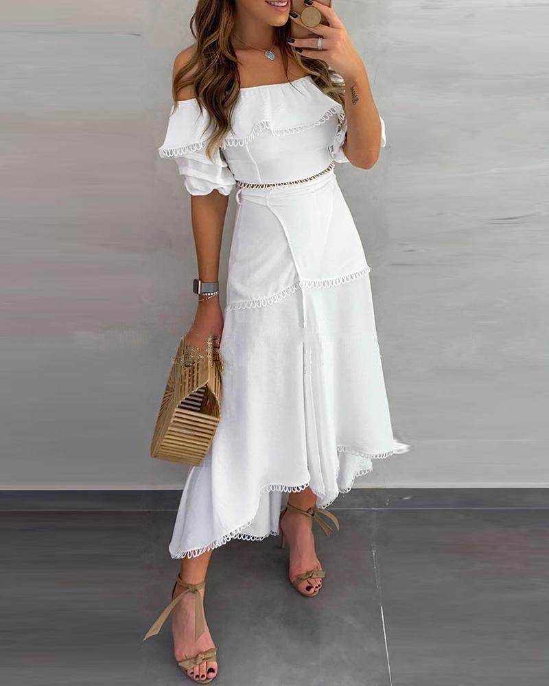 woman wearing white off shoulder half sleeve ankle-length patchwork pullover dress holding wicker bag