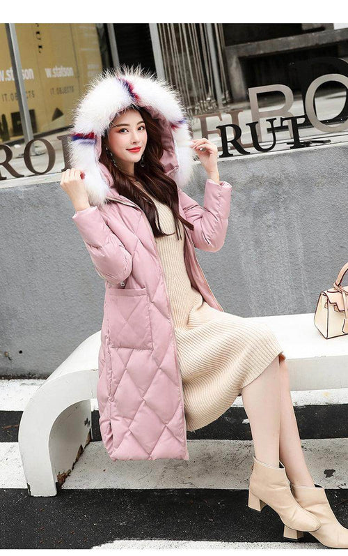 Black autumn and winter hooded fur collar long coat with tailored fit and deep pockets